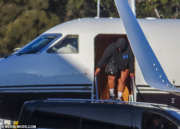 Lizzo displays her lengthy legs in bike shorts as she disembarks from ...